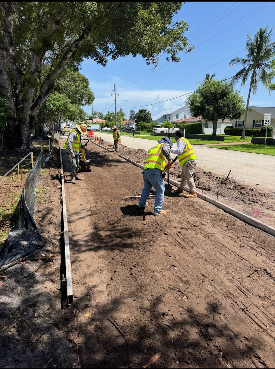 Crew preparing a residential sidewalk project