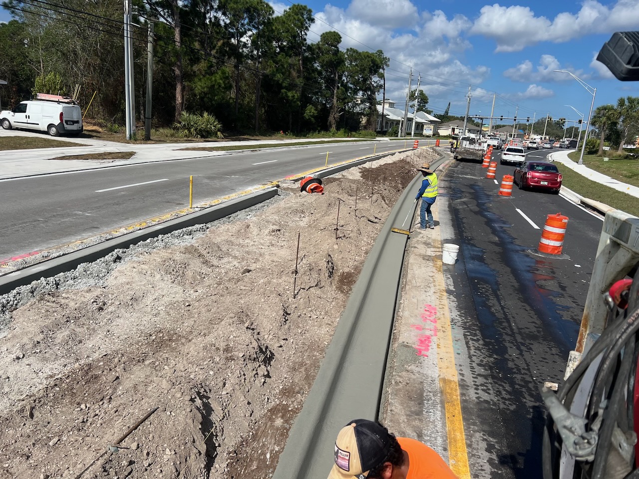 Concrete median construction beside an active roadway