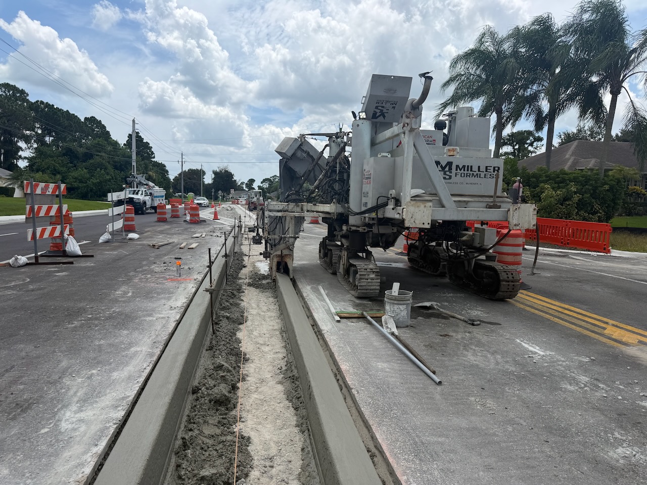 Concrete paving machine working on a roadway