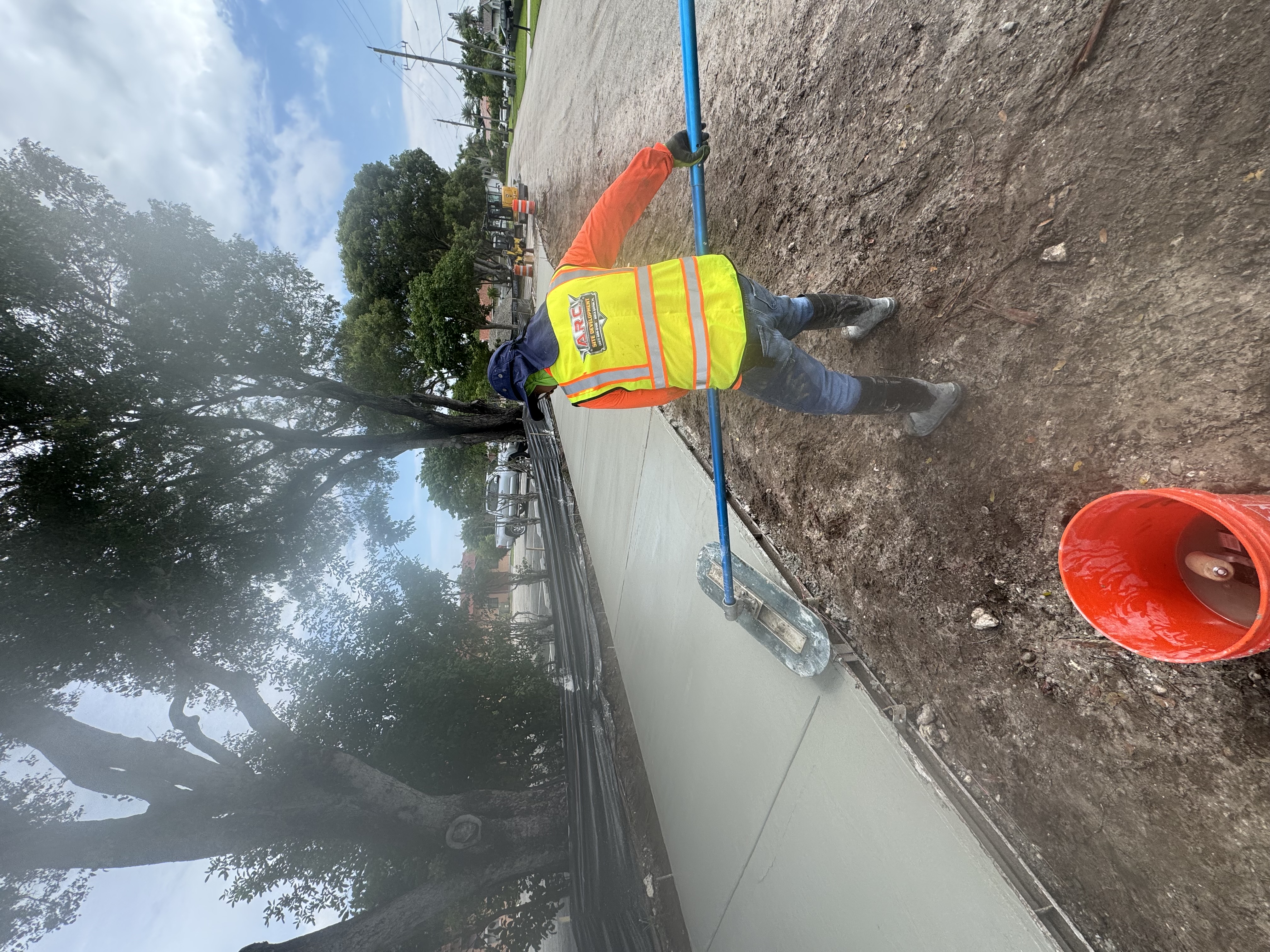 Sidewalk installation with forms and construction equipment